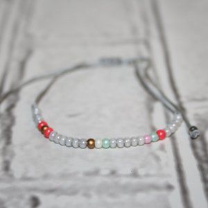 Beautiful gray cord and glass beaded bracelet adjustable